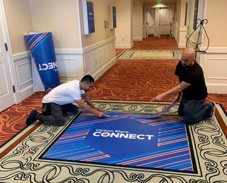 Professional installation of large-format graphics including vehicle wraps, wall murals, and window decals