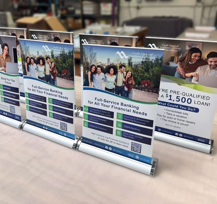 Retractable banner stand with printed graphics